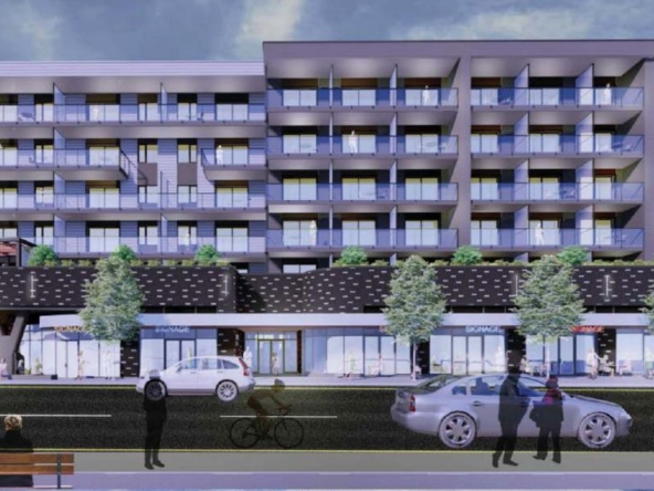 Image of The Central building with cars and pedestrians our front on the sidewalk.